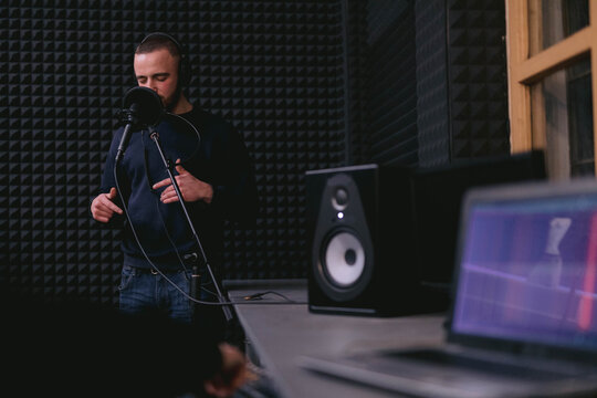 Singer having mail rehearsal before online and live performance on radio 