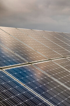 Reflection of the dramatic sky on the photovoltaic modules