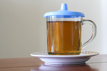 a glass of hot tea served in the morning as a complement to breakfast