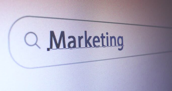 Browser bar with typed Marketing keyword on the computer screen, SEO Concept