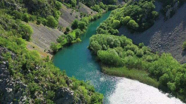 Winding River Of Zrmanja With Green Trees and Plants On Canyon In Croatia. - aerial