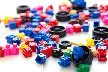 A child's toy blocks scattered on the floor.