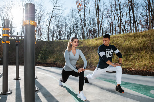 Young athletes lunging during training