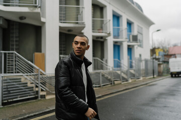 Man Walking Out His House