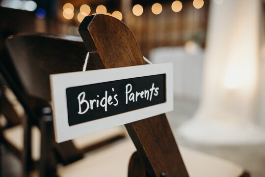 Chair at Wedding Ceremony with Sign for 'Bride's Parents'