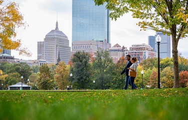 View of Boston with couple in park