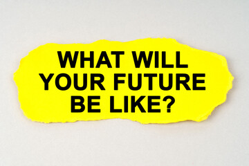 On a white background lies yellow paper with the inscription - WHAT WILL YOUR FUTURE BE LIKE