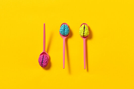 Colored brains on spoons