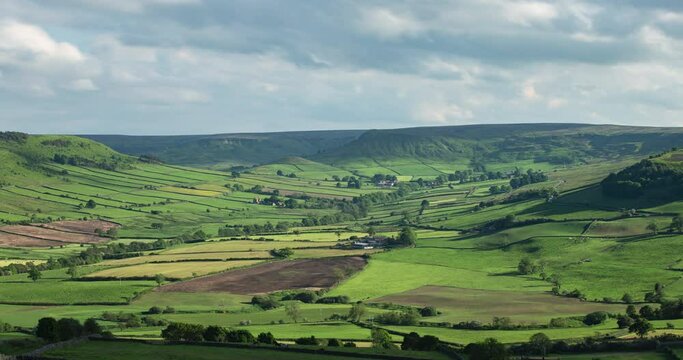 Timelapse from Oakley Walls looking towards Danby Dale, summer with green fields and rolling clouds Time Lapse