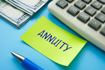 Financial concept about ANNUITY with inscription on the piece of paper.