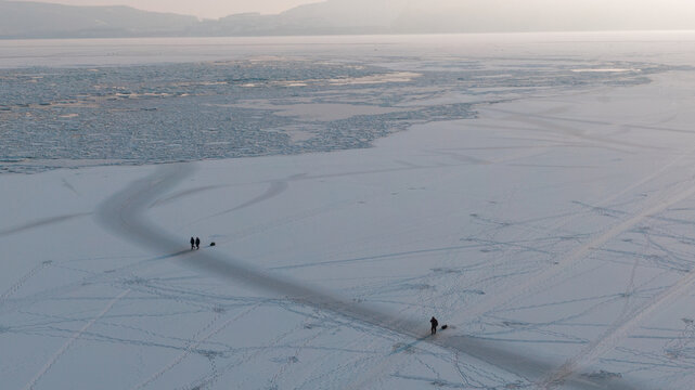 Lonely northern landscape - fishermen returning home 