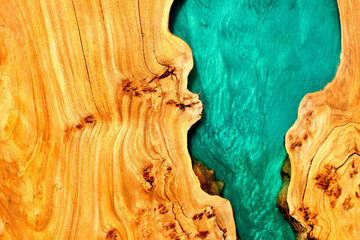 turquoise epoxy resin panel with walnut, texture for design