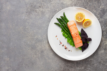Dish, salmon fillet with asparagus, on a white plate, top view, horizontal, no people,