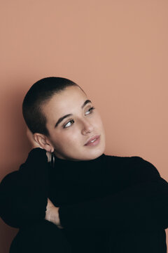 Sensual girl with shaved head.