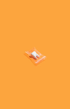 Tooth In Plastic Bag.