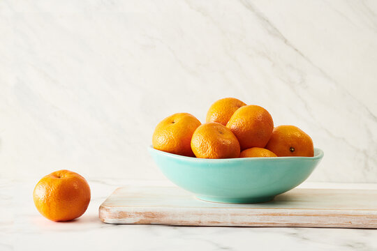 Bowl of Madarin Oranges on Marble Counter 