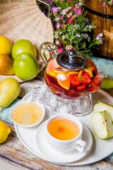 bright summer fruit tea on the table in the restaurant