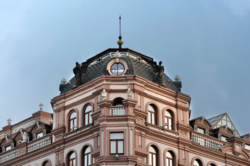 Fototapeta na wymiar Top of old building facade in Kyiv Ukraine