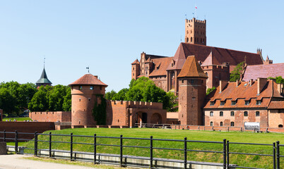 Fototapeta na wymiar View of largest medieval brick Castle of Teutonic Order in Malbork, Poland .