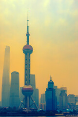 Obraz premium Shanghai skyline in sunny morning with cloud sky, misty and Huangpu river cityscape view