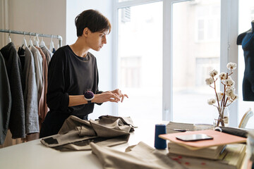 woman fashion designer at work