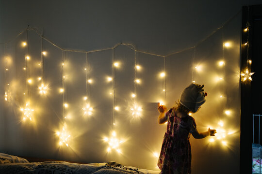 Little child and lights - Powered by Adobe