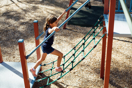 Young girl, walking the park obstacles