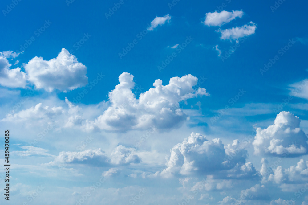 Wall mural blue sky background with tiny clouds. panorama white fluffy clouds in the blue sky.beautiful vast bl