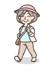快活に歩くおばあさん