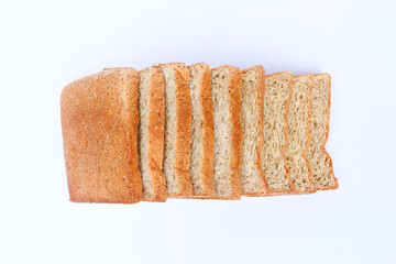sliced whole wheat bread on white background