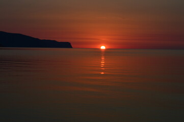 Fototapeta na wymiar Sunrise Orange -Golden Our in Pollença Bay