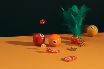 Leisure games concept with gambling dice poker cards and money chips and billiard ball