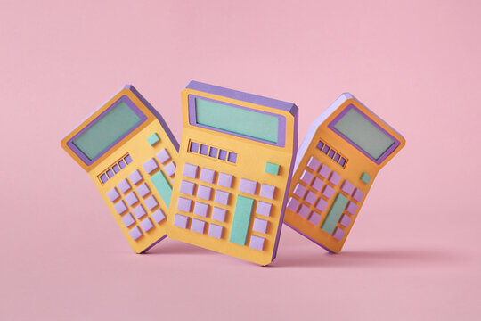 Three retro calculators from paper vertically standing.