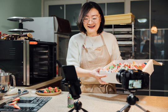 asian woman baking at home