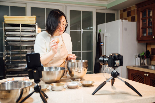 asian woman baking at home
