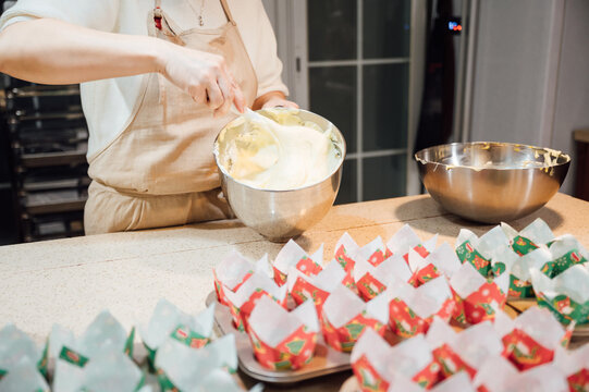 asian woman baking at home