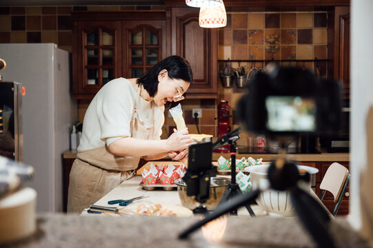 asian woman baking at home