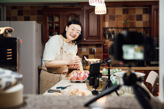 asian woman baking at home