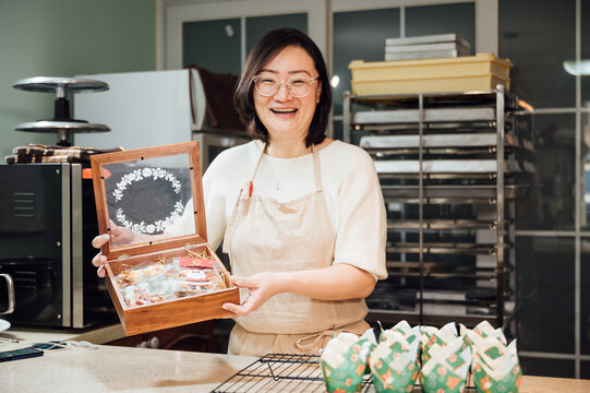 asian woman baking at home