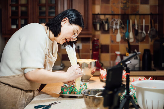 asian woman baking at home