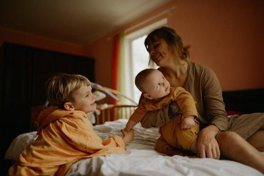 
young mother and her sons