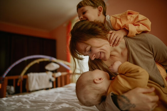 
young mother and her sons