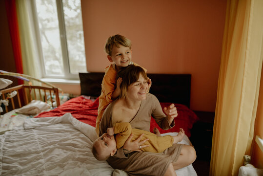 
young mother and her sons
