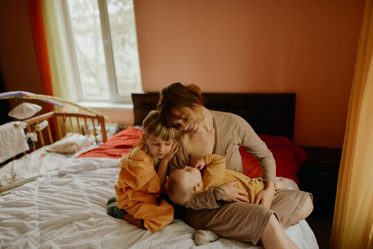 
young mother and her sons