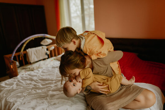 
young mother and her sons