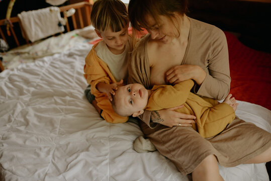 
young mother and her sons