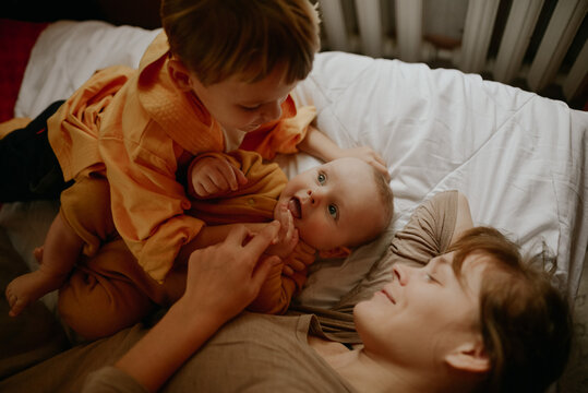 
young mother and her sons