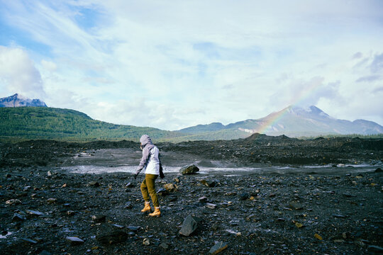 Woman walking Alaska territory.