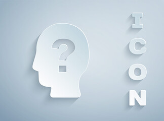 Paper cut Human head with question mark icon isolated on grey background. Paper art style. Vector