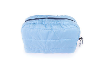 female blue cosmetic bag isolated on white